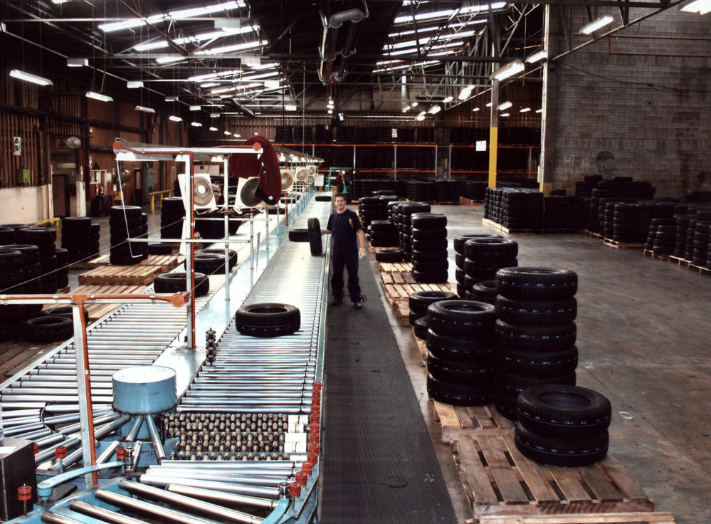 Dunlop finished tyres; sorting conveyor, viewed from the inspection platform
