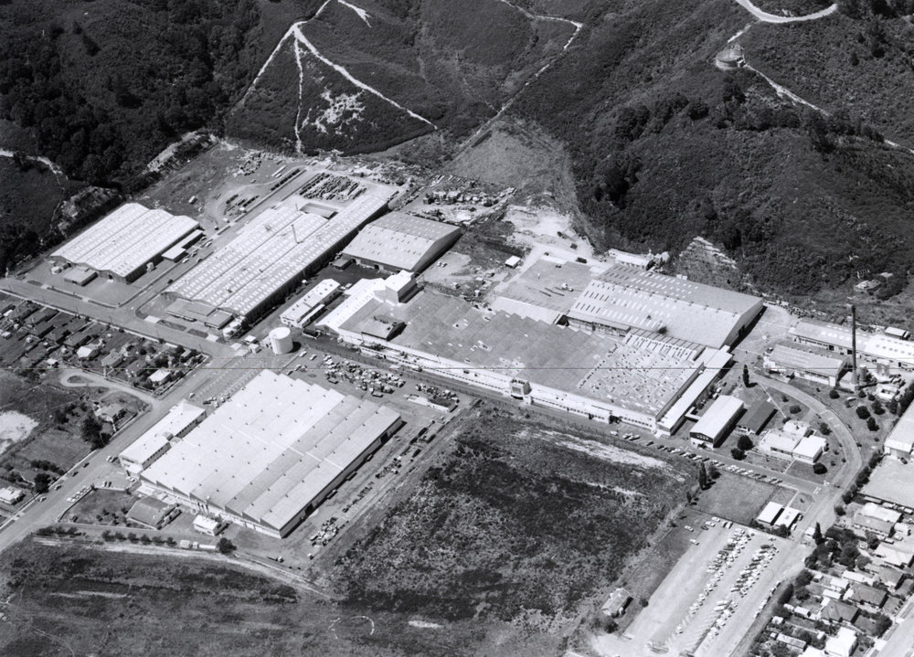 Dunlop and Felt &amp; Textiles factories, and General Motors warehouse; aerial view from the north-west