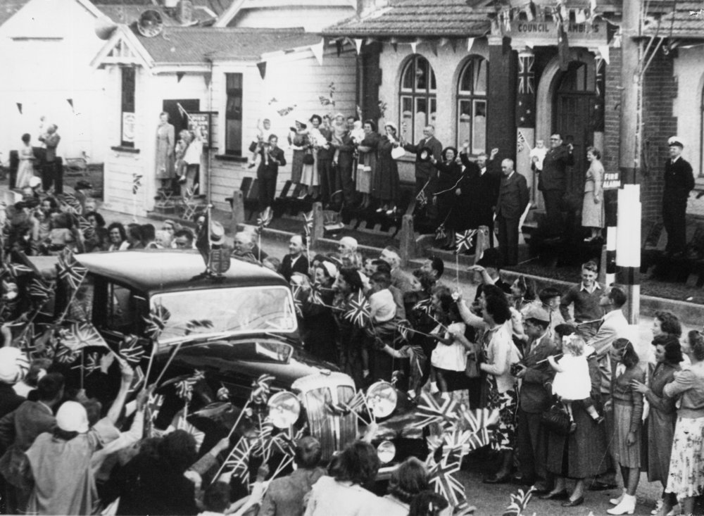 Royal tour 1954; crowd in Main Street cheering the Queen
