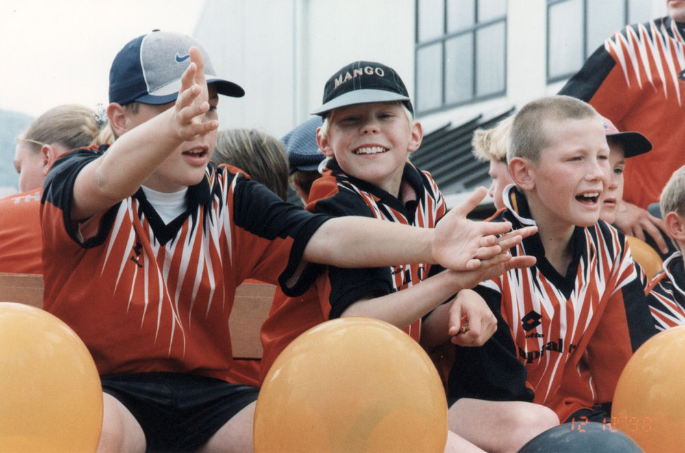 Christmas parade 1998; boys on float