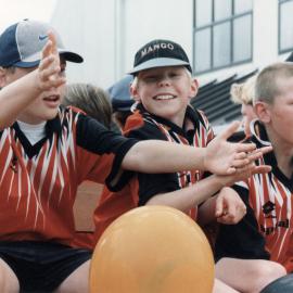 Christmas parade 1998; boys on float