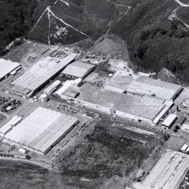 Dunlop and Felt & Textiles factories, and General Motors warehouse; aerial view from the north-west